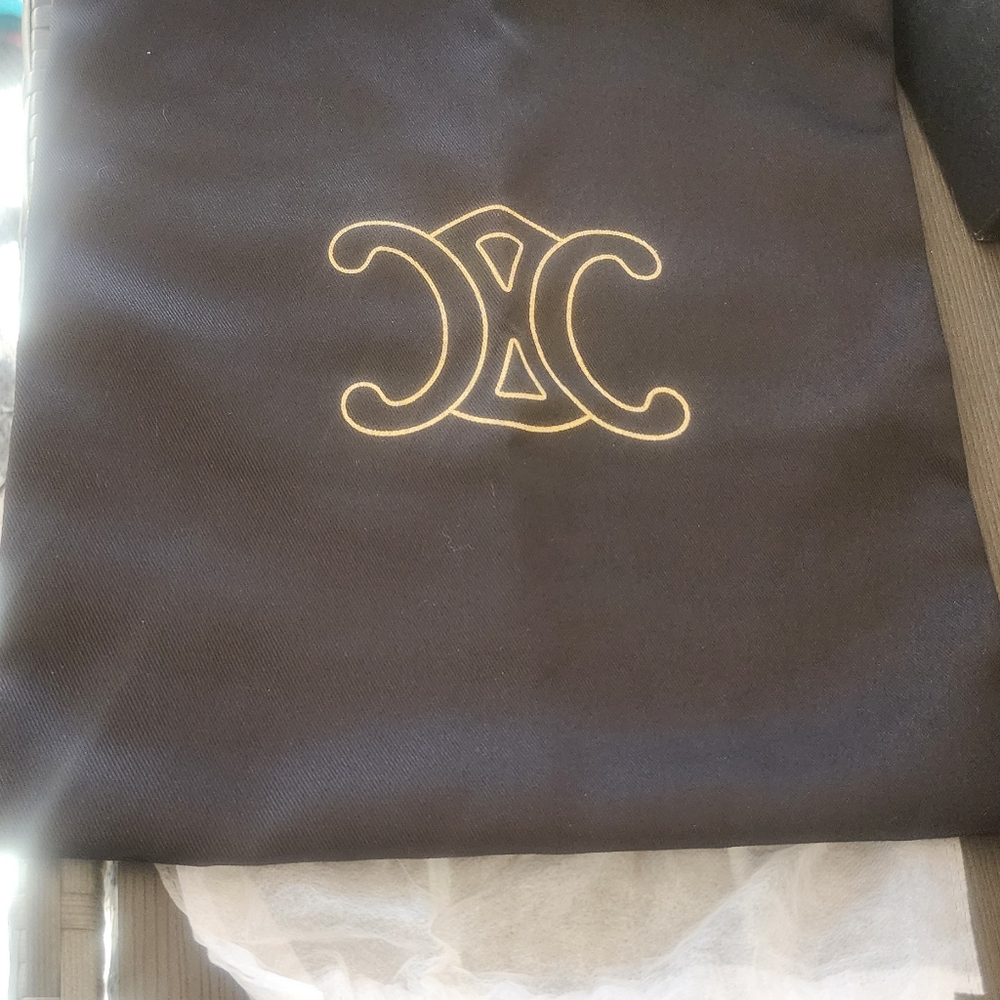 Celine Elegant Black Tote with Gold Emblem